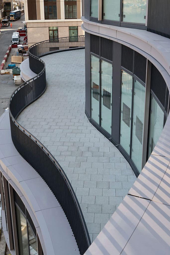 Curved paved terrace from above