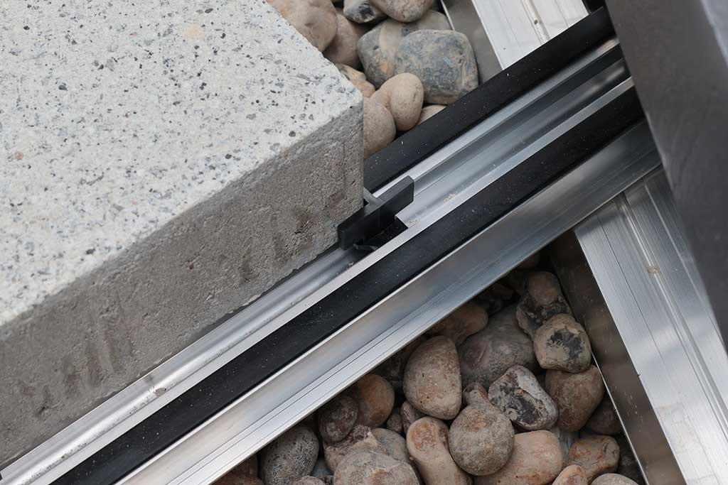 Rail system paving spacer