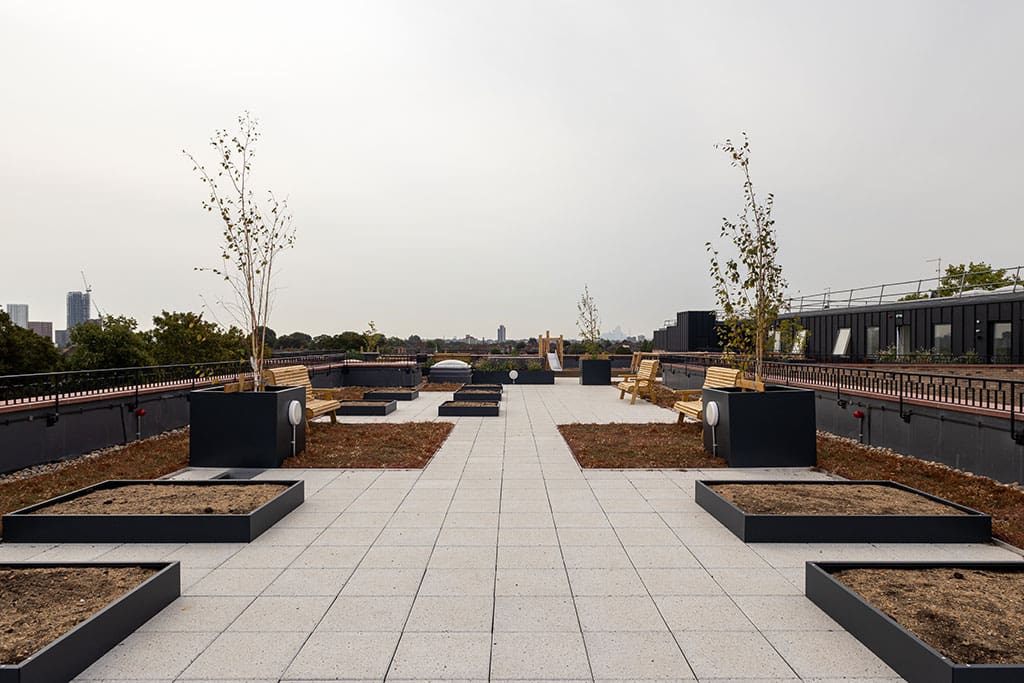 Paved roof terrace social space