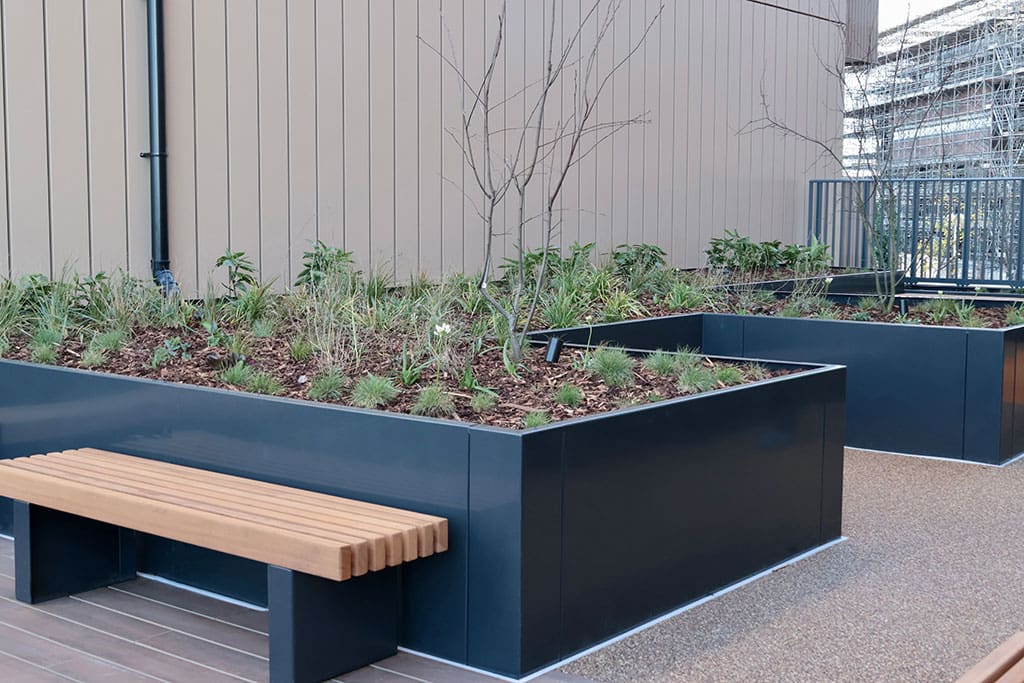 Planters and benches on Resin Bound and Vitrified Composite