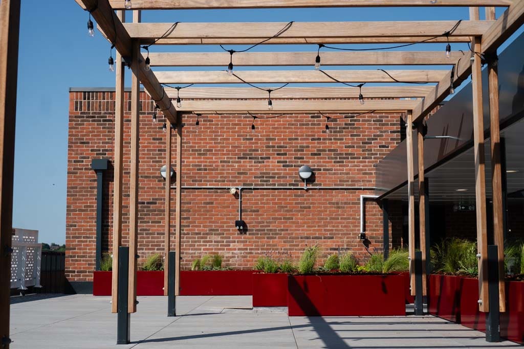 Planters, pavers, and pergola