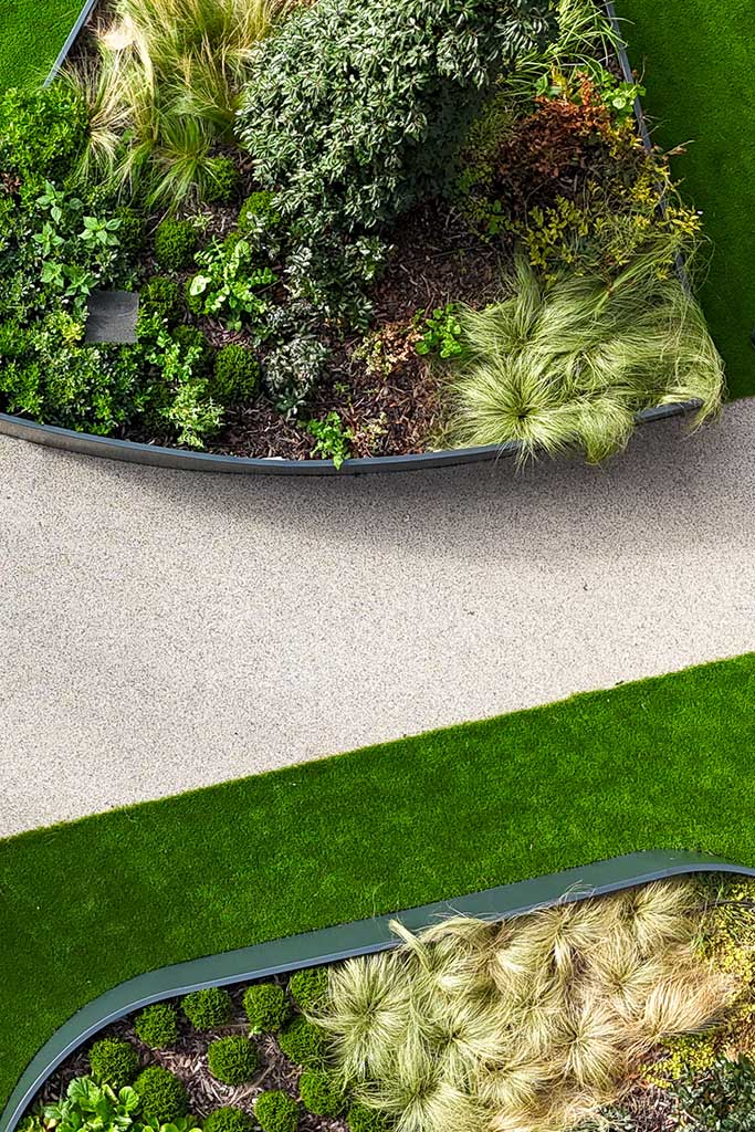 Planter, path, and grass aerial view
