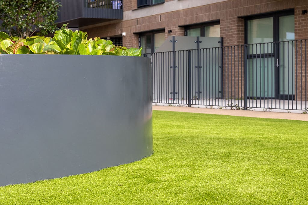 Planter on artificial grass
