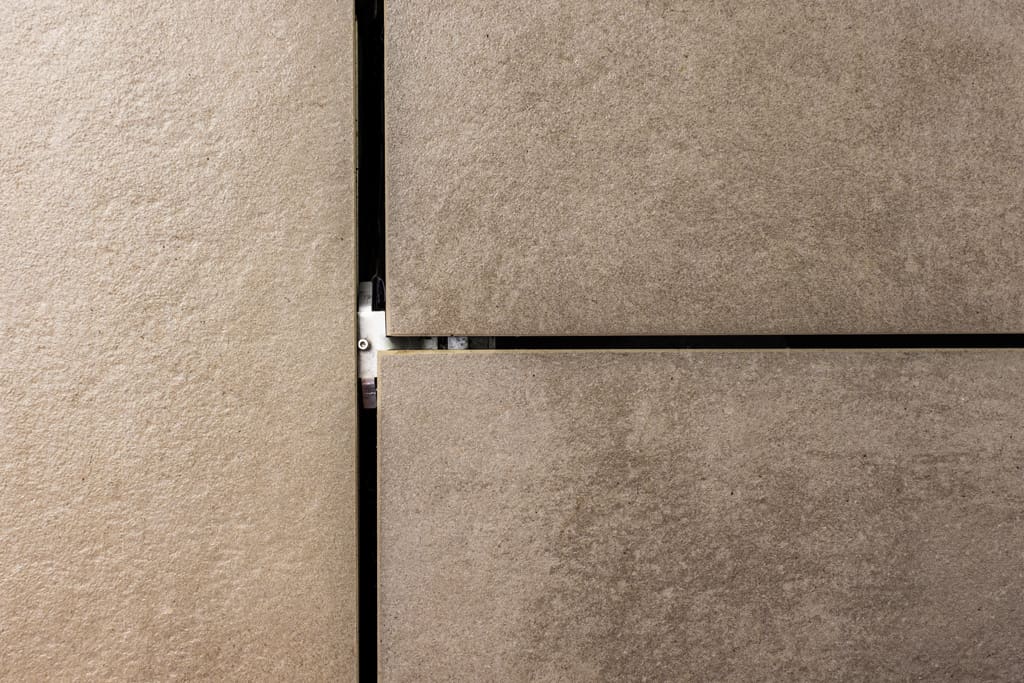 Paving hidden wind uplift prevention