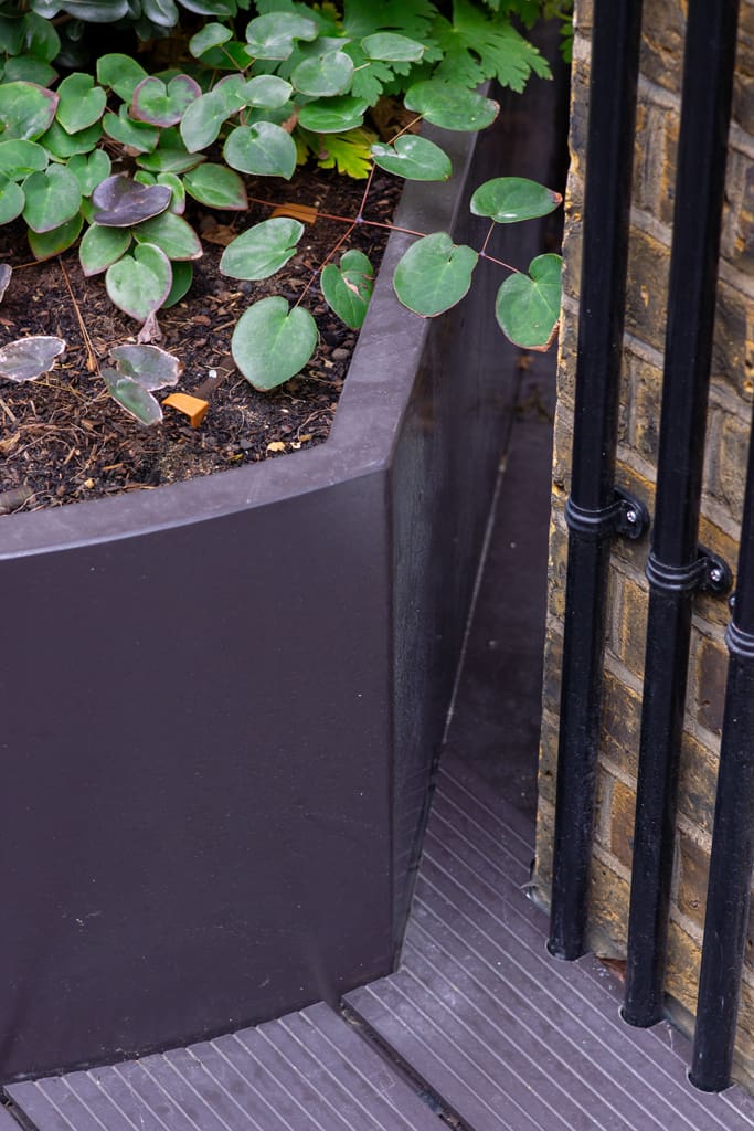Egyptian & Dudley House planter close-up