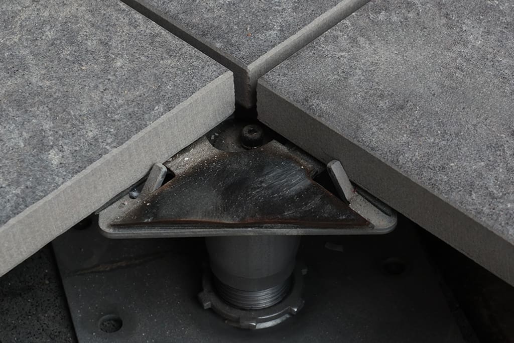 Paving on self levelling pedestals