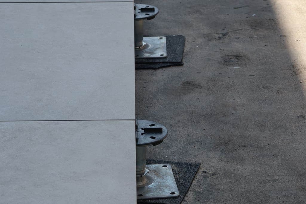 Meridian One pedestals and paving