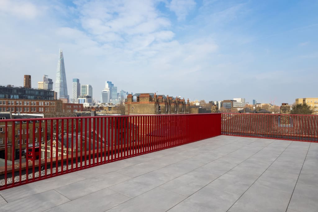 Balustrade attached to paving system with BaseLink