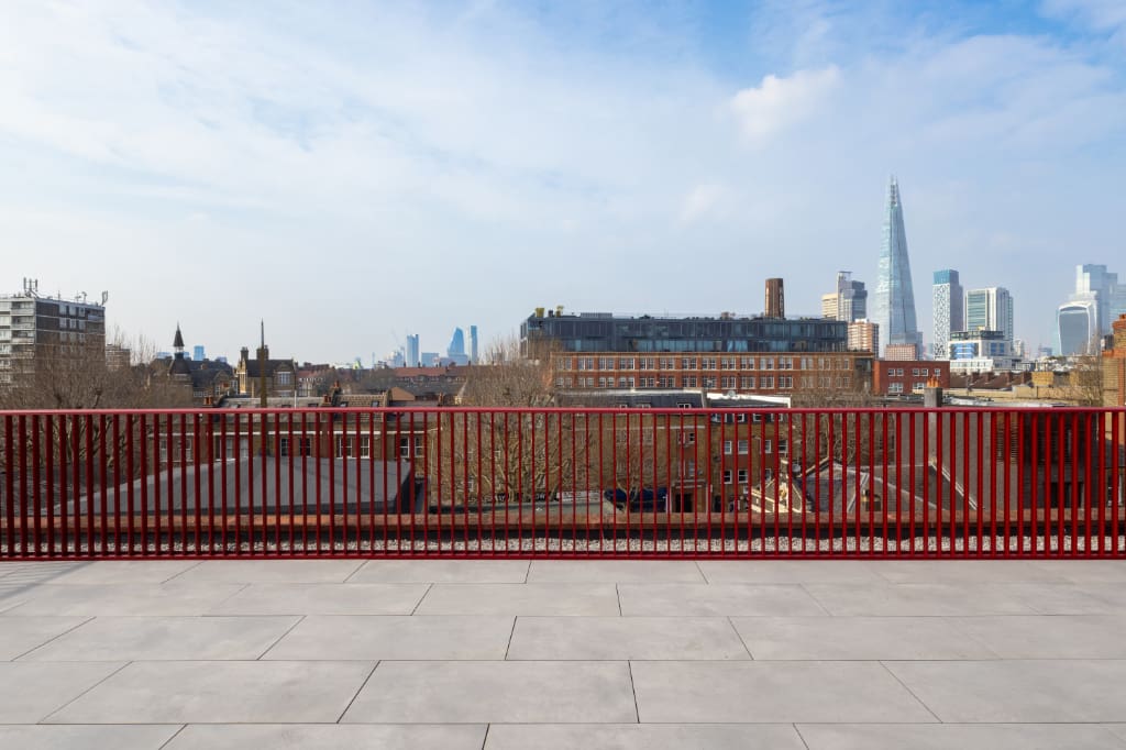 Balustrade attached to paving system with BaseLink