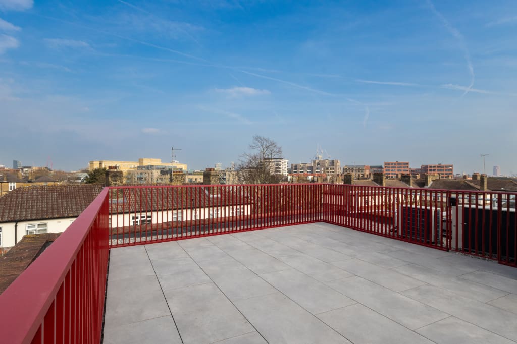 Balustrade attached to paving system with BaseLink