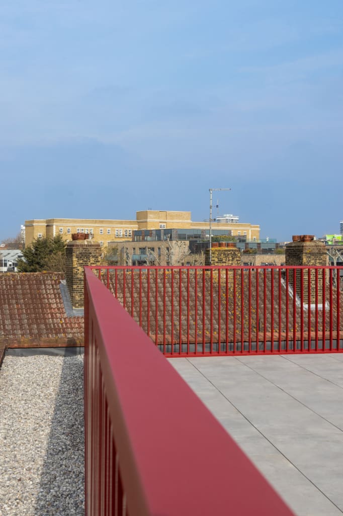 Balustrade attached to paving system with BaseLink