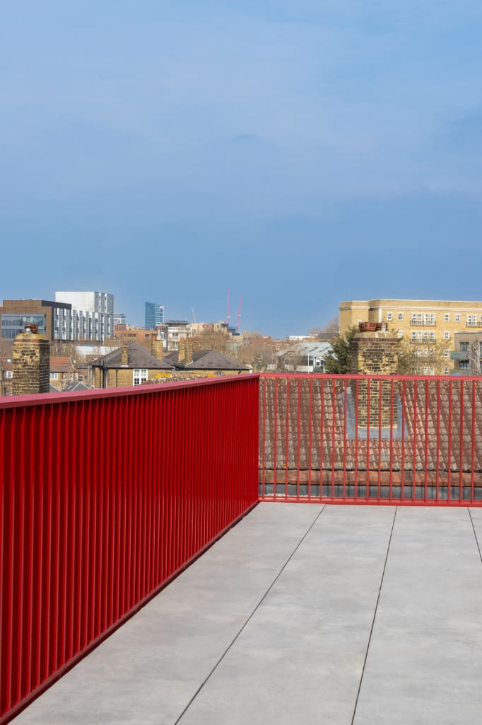 Balustrade attached to paving system with BaseLink