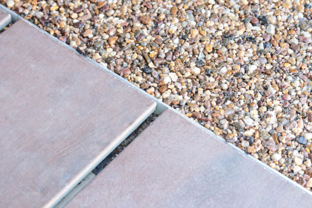 Vitrified Composite Decking and Resin Bound Gravel on integrated system