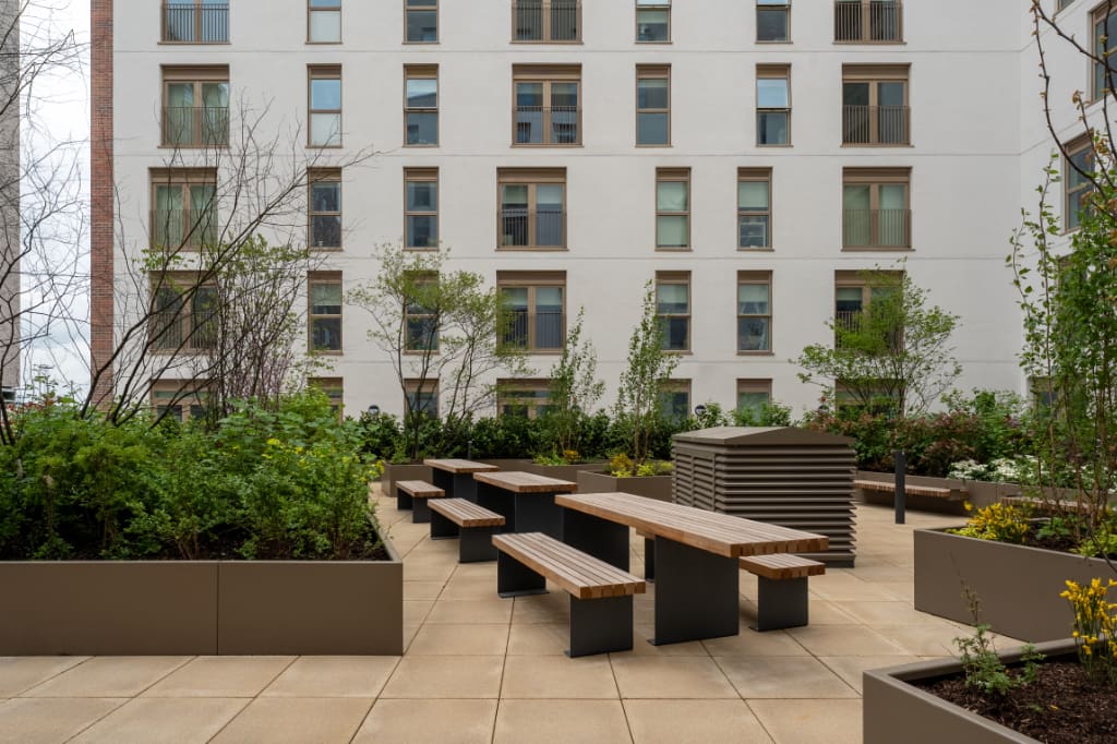 Planters with seating on paving