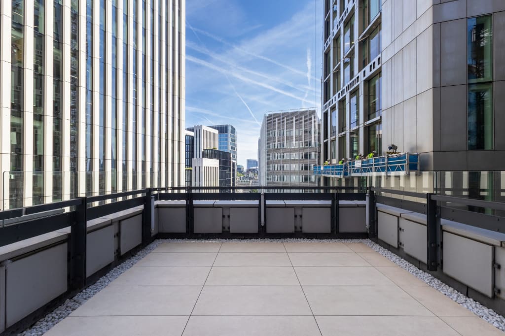 Paved roof terrace