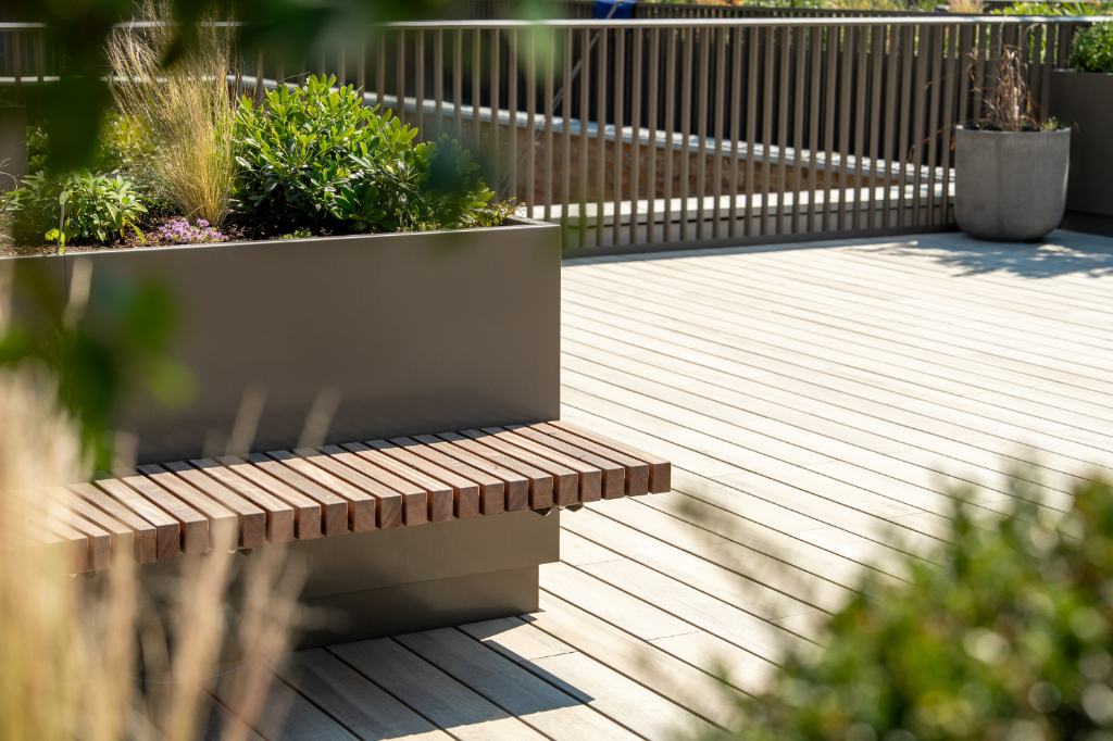 Decked roof terrace with seating and planters