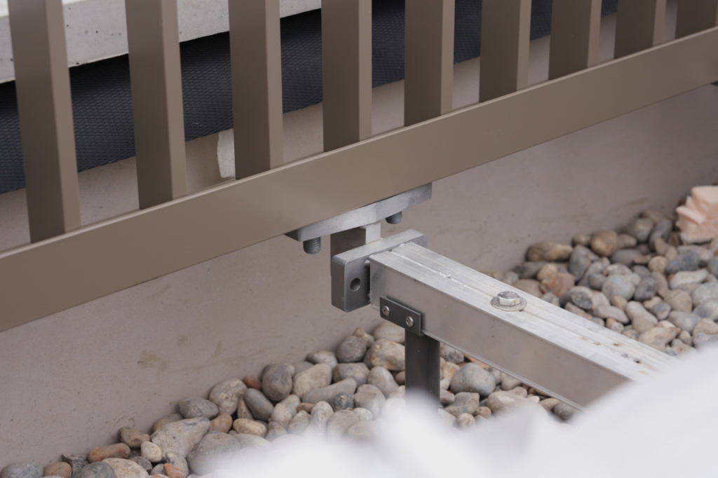 Decking rail system linked to balustrade with BaseLink