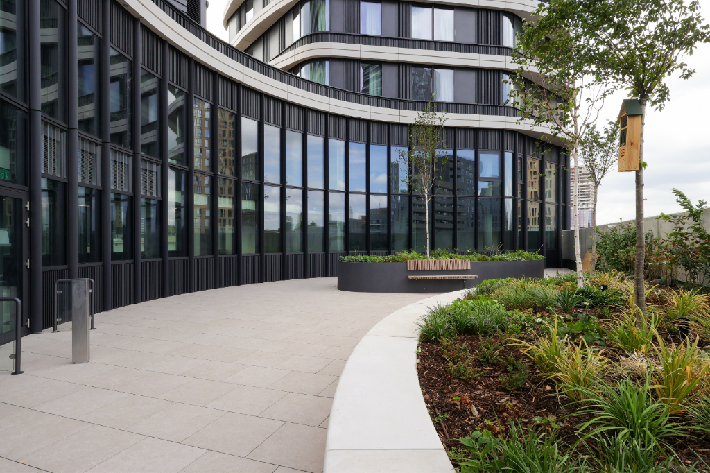 Paved courtyard with planters