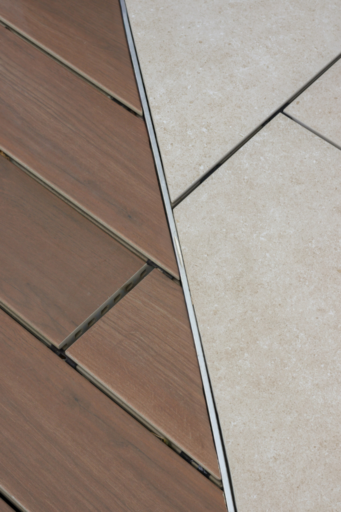 Vitrified Composite Decking meeting paving