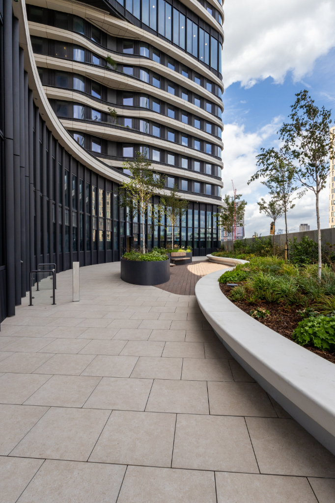 Paved courtyard with planters