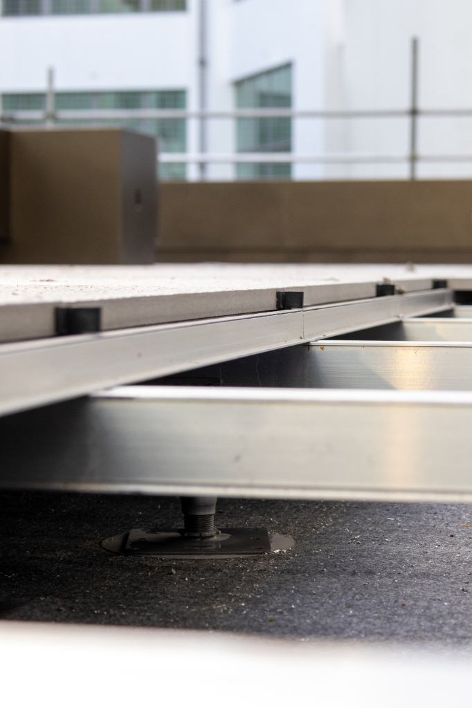 Pavers on rail system