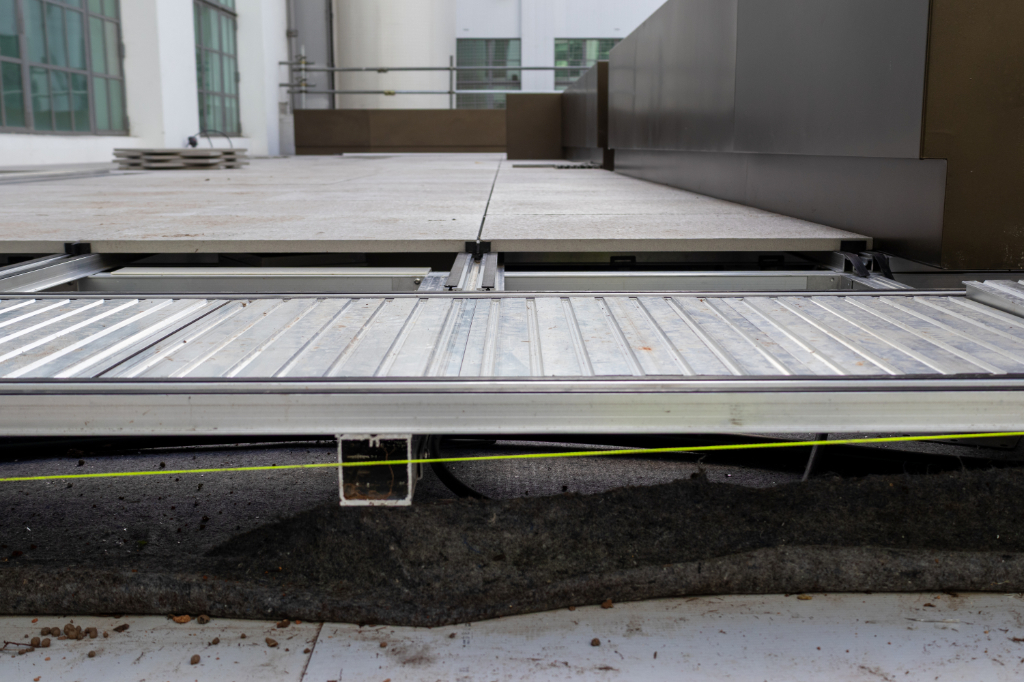 Pavers installed on BaseBoard rail system